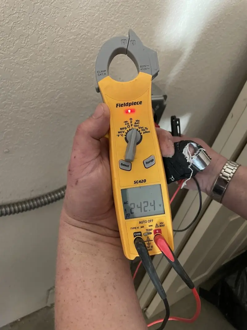Voltage testing with clamp meter during Electrical Installation Services in Redlands